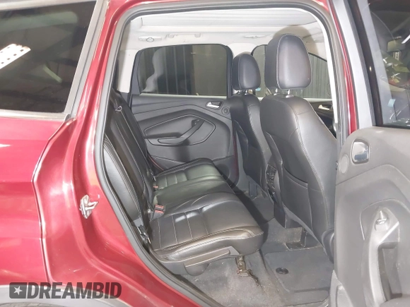 2014 Ford Escape Titanium with VIN 1FMCU9J9XEUD69589, listed as a IAAI auction lot 42031882 with 123,632 mi miles and . Bid and sale history available at DreamBid. Image 8.