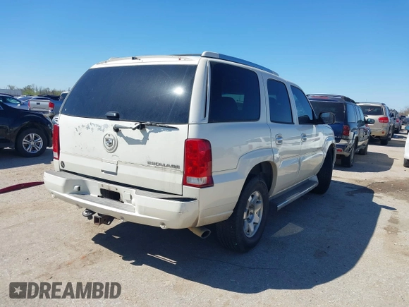 2006 Cadillac Escalade z VIN 1GYEK63NX6R109252, wystawiony jako IAAI lot #41755712 z przebiegiem 188 864 mil mil oraz . Historia ofert i sprzedaży dostępna na DreamBid. Obrazek 4.
