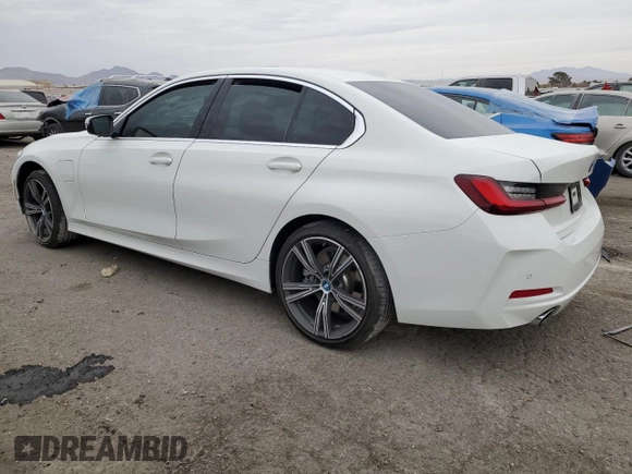 2024 BMW 3 Series 330e with VIN 3MW39FF06R8E35070, listed as a Copart auction lot 42796155 with 3,987 mi miles and Salvage Title. Bid and sale history available at carsss.com. Image 2.