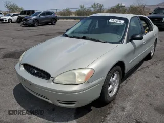 2007 Ford Taurus SE with VIN 1FAFP53U27A156844, listed as a Copart auction lot 59204695 with 157,633 mi miles and Salvage title. Bid and sale history available at DreamBid. Image 1.