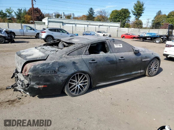 2015 Jaguar XJ with VIN SAJWJ1CD1F8V90815, listed as a Copart auction lot 77977464 with Not provided miles and Salvage title. Bid and sale history available at DreamBid. Image 3.