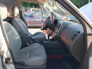 2006 Ford Escape XLT with VIN 1FMYU93156KD26045, listed as a IAAI auction lot 42503718 with 141,738 mi miles and . Bid and sale history available at DreamBid. Image 5.