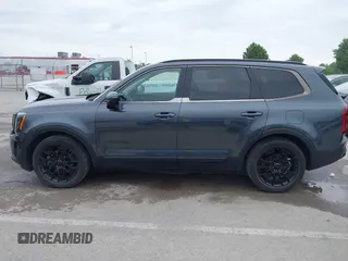 2021 Kia Telluride SX with VIN 5XYP5DHC9MG095972, listed as a IAAI auction lot 42345283 with 125,548 mi miles and . Bid and sale history available at DreamBid. Image 14.