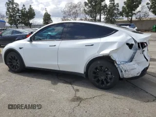 2022 Tesla Model Y Long Range with VIN 7SAYGDEE3NF558379, listed as a Copart auction lot 48594035 with 12,501 mi miles and Salvage Title. Bid and sale history available at carsss.com. Image 2.