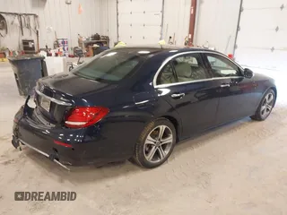 2018 Mercedes-Benz E with VIN WDDZF4KB7JA382850, listed as a IAAI auction lot 41991305 with 56,187 mi miles. Bid and sale history available at carsss.com. Image 4.