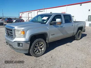 2015 GMC Sierra 1500 SLT with VIN 3GTU2VEJ8FG430051, listed as a IAAI auction lot 41208698 with 191,699 mi miles and . Bid and sale history available at DreamBid. Image 2.