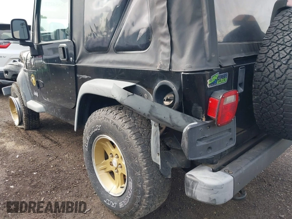 2006 Jeep Wrangler Sport z VIN 1J4FA49S06P721223, wystawiony jako IAAI lot #42654272 z przebiegiem 225 223 mil mil oraz . Historia ofert i sprzedaży dostępna na DreamBid. Obrazek 17.