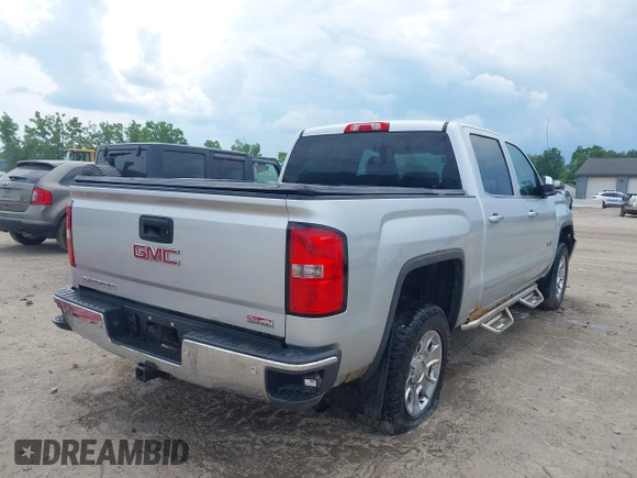 2014 GMC Sierra 1500 SLT with VIN 3GTU2VEC2EG100051, listed as a IAAI auction lot 40363924 with 149,636 mi miles and . Bid and sale history available at DreamBid. Image 4.