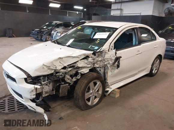 2014 Mitsubishi Lancer SE with VIN JA32V2FW1EU018927, listed as a IAAI auction lot 42059116 with 148,874 mi miles and . Bid and sale history available at carsss.com. Image 17.