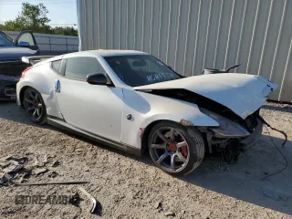 2014 Nissan 370Z Touring with VIN JN1AZ4EH5EM630793, listed as a Copart auction lot 77950484 with 110,229 mi miles and Salvage Title. Bid and sale history available at carsss.com. Image 4.