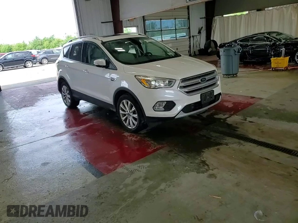2018 Ford Escape Titanium с VIN 1FMCU9J90JUB30658, выставлен на аукционе Copart как лот 64001665 с пробегом 61 970 миль миль и Списание • Salvage title. История ставок и продаж доступна на DreamBid. Изображение 14.