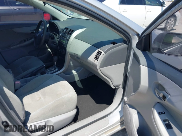 2010 Toyota Corolla z VIN 2T1BU4EEXAC292885, wystawiony jako IAAI lot #42399432 z przebiegiem 155 912 mil mil oraz . Historia ofert i sprzedaży dostępna na DreamBid. Obrazek 5.