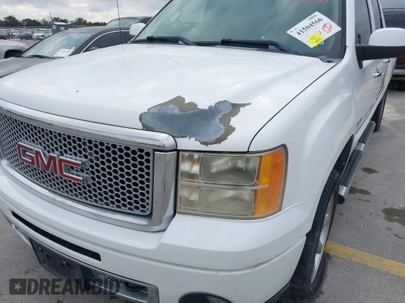 2011 GMC Sierra 1500 Denali z VIN 3GTP2XE25BG404518, wystawiony jako IAAI lot #41504566 z przebiegiem 187 926 mil mil oraz . Historia ofert i sprzedaży dostępna na DreamBid. Obrazek 6.