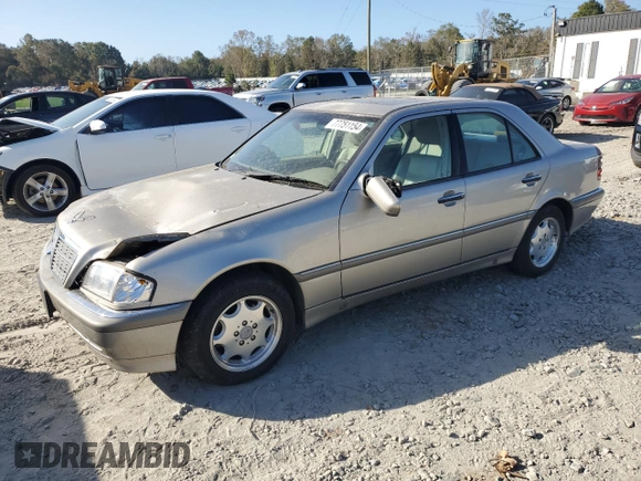 1998 Mercedes-Benz C 230/260/280/320 with VIN WDBHA23G8WA620777, listed as a Copart auction lot 77751154 with 144,032 mi miles and Salvage Title. Bid and sale history available at carsss.com. Image 1.