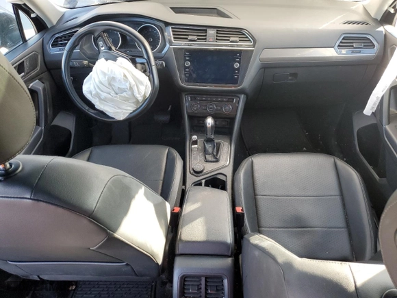 2019 Volkswagen Tiguan SE with VIN 3VV2B7AXXKM087236, listed as a Copart auction lot 82528214 with 0 mi miles and Salvage Title. Bid and sale history available at carsss.com. Image 8.