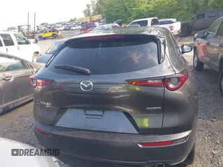 2024 Mazda CX-30 S Select Sport z VIN 3MVDMBBM1RM634542, wystawiony jako IAAI lot #42204673 z przebiegiem 24 694 mil mil oraz . Historia ofert i sprzedaży dostępna na DreamBid. Obrazek 16.