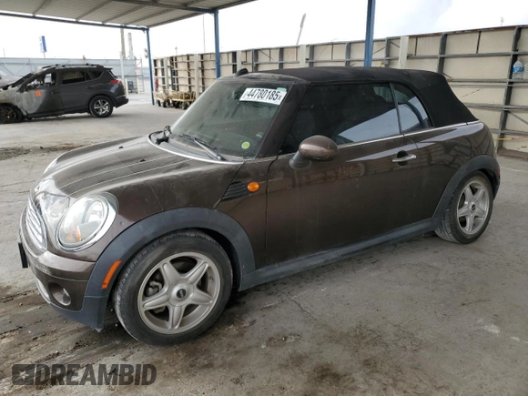 2010 MINI Convertible with VIN WMWMR3C50ATU97547, listed as a Copart auction lot 44780185 with 91,194 mi miles and Salvage Title. Bid and sale history available at DreamBid. Image 1.