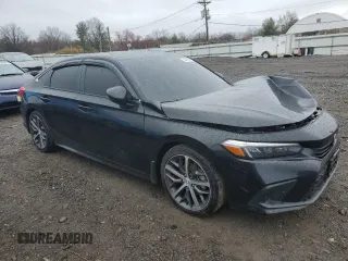 2024 Honda Civic Touring z VIN 2HGFE1F97RH316075, wystawiony jako Copart lot #50006805 z przebiegiem Nie podano mil oraz Szkoda całkowita • Salvage title. Historia ofert i sprzedaży dostępna na DreamBid. Obrazek 4.