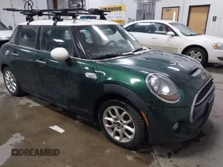 2015 MINI Hardtop 4 Door S z VIN WMWXU3C55FT892293, wystawiony jako IAAI lot #41359066 z przebiegiem 112 704 mil mil oraz . Historia ofert i sprzedaży dostępna na DreamBid. Obrazek 1.