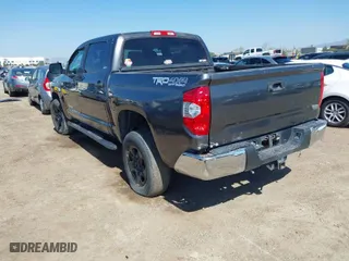 2014 Toyota Tundra 4WD Truck SR5 with VIN 5TFDY5F14EX377131, listed as a IAAI auction lot 41749424 with 150,203 mi miles. Bid and sale history available at carsss.com. Image 3.