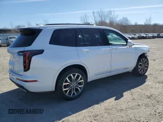 2025 Cadillac XT6 AWD Sport z VIN 1GYKPHRS5SZ101521, wystawiony jako Copart lot #48552185 z przebiegiem 262 mil mil oraz Szkody całkowita. Historia ofert i sprzedaży dostępna na DreamBid. Obrazek 3.