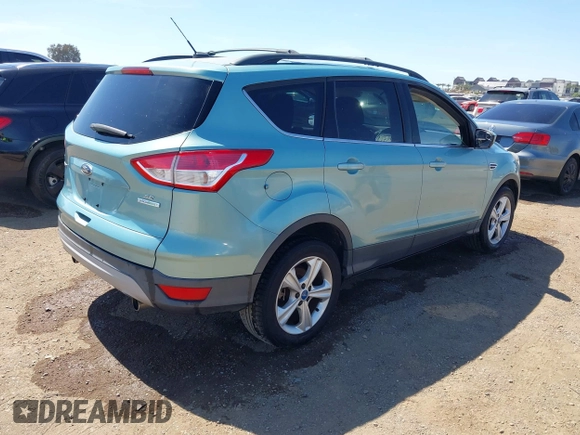 2013 Ford Escape SE with VIN 1FMCU0GX6DUC54374, listed as a IAAI auction lot 42712880 with 140,966 mi miles and . Bid and sale history available at DreamBid. Image 4.