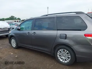 2014 Toyota Sienna XLE with VIN 5TDYK3DC0ES496716, listed as a IAAI auction lot 42494549 with 158,645 mi miles and . Bid and sale history available at DreamBid. Image 14.