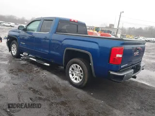 2017 GMC Sierra 1500 SLE z VIN 1GTV2MEC4HZ214619, wystawiony jako IAAI lot #41522006 z przebiegiem 184 513 mil mil oraz . Historia ofert i sprzedaży dostępna na DreamBid. Obrazek 3.