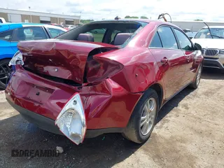 2005 Pontiac G6 with VIN 1G2ZG548754127123, listed as a IAAI auction lot 42365596 with 107,863 mi miles and . Bid and sale history available at DreamBid. Image 4.