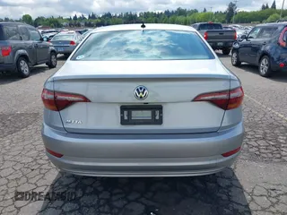 2019 Volkswagen Jetta S with VIN 3VWC57BU2KM215738, listed as a IAAI auction lot 42131376 with 52,720 mi miles and . Bid and sale history available at DreamBid. Image 16.