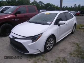 2023 Toyota Corolla LE with VIN 5YFB4MDE0PP044882, listed as a IAAI auction lot 42197619 with 56,945 mi miles. Bid and sale history available at carsss.com. Image 1.