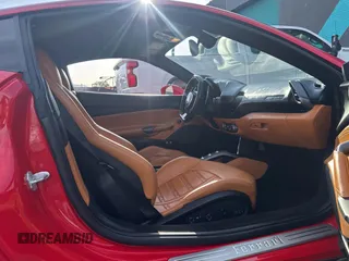 2016 Ferrari 488 z VIN ZFF79ALA0G0214884, wystawiony jako Copart lot #58627785 z przebiegiem 6311 mil mil oraz Szkody całkowita. Historia ofert i sprzedaży dostępna na DreamBid. Obrazek 5.