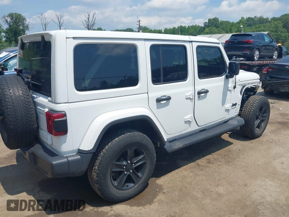 2021 Jeep Wrangler Unlimited Sahara with VIN 1C4HJXEN1MW618508, listed as a IAAI auction lot 42639515 with 39,747 mi miles and . Bid and sale history available at DreamBid. Image 4.