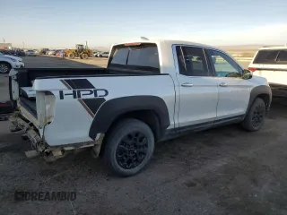 2022 Honda Ridgeline RTL-E with VIN 5FPYK3F77NB031233, listed as a Copart auction lot 49735525 with 71,450 mi miles and Salvage Title. Bid and sale history available at DreamBid. Image 3.