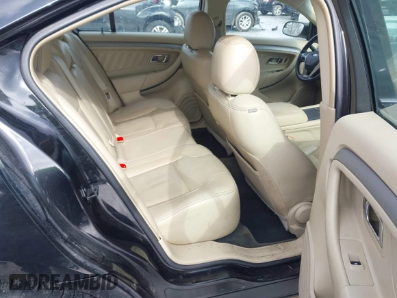 2013 Ford Taurus SEL with VIN 1FAHP2H80DG234999, listed as a IAAI auction lot 41577003 with 115,403 mi miles and . Bid and sale history available at DreamBid. Image 8.