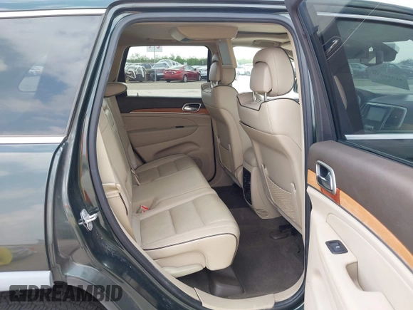 2011 Jeep Grand Cherokee Overland with VIN 1J4RR6GG4BC564913, listed as a IAAI auction lot 41910250 with 58,936 mi miles and . Bid and sale history available at DreamBid. Image 8.