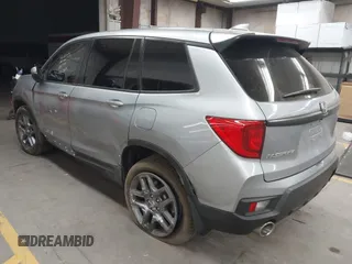 2023 Honda Passport EX-L with VIN 5FNYF8H56PB025612, listed as a IAAI auction lot 41937956 with 31,065 mi miles and . Bid and sale history available at DreamBid. Image 3.