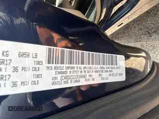 2014 Dodge Grand Caravan SXT with VIN 2C4RDGCG1ER308403, listed as a Copart auction lot 56712885 with 131,847 mi miles and Clean Title. Bid and sale history available at DreamBid. Image 10.