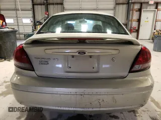 2004 Ford Taurus SE with VIN 1FAFP53U74G122231, listed as a Copart auction lot 42904044 with 116,851 mi miles and Salvage Title. Bid and sale history available at DreamBid. Image 6.