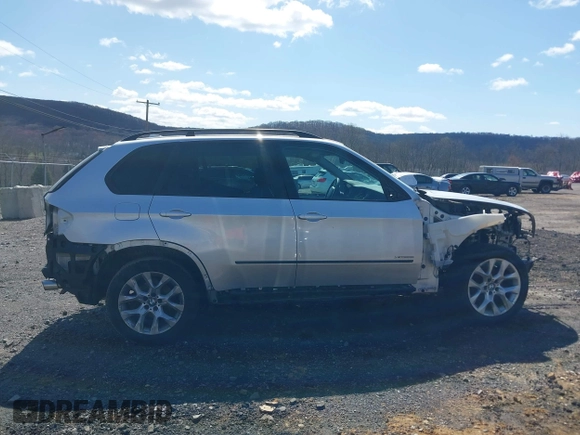 2012 BMW X5 35i с VIN 5UXZV4C56CL986384, выставлен на аукционе IAAI как лот 41986665 с пробегом Не указан миль и . История ставок и продаж доступна на DreamBid. Изображение 13.