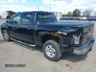 2012 Chevrolet Silverado 1500 LT with VIN 1GCPKSE72CF207419, listed as a IAAI auction lot 42051689 with 251,419 mi miles and . Bid and sale history available at DreamBid. Image 3.