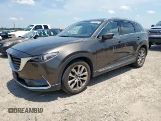 2019 Mazda CX-9 Grand Touring z VIN JM3TCBDY1K0305811, wystawiony jako Copart lot #56203005 z przebiegiem 59 380 mil mil oraz Szkoda całkowita • Salvage title. Historia ofert i sprzedaży dostępna na DreamBid. Obrazek 1.