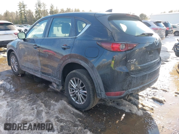 2018 Mazda CX-5 Sport with VIN JM3KFBBM8J0372701, listed as a IAAI auction lot 41643531 with 85,886 mi miles. Bid and sale history available at carsss.com. Image 3.