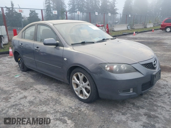 2009 Mazda Mazda3 i Touring Value with VIN JM1BK32G291214834, listed as a IAAI auction lot 40894075 with 128,040 mi miles. Bid and sale history available at carsss.com. Image 1.