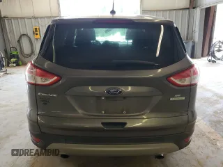 2014 Ford Escape SE with VIN 1FMCU0GX4EUA81634, listed as a Copart auction lot 48290955 with 107,286 mi miles and Salvage Title. Bid and sale history available at DreamBid. Image 6.