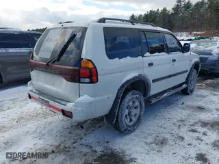 2003 Mitsubishi Montero Sport ES with VIN JA4LS21H03J001519, listed as a IAAI auction lot 41375342 with 225,148 mi miles. Bid and sale history available at carsss.com. Image 4.