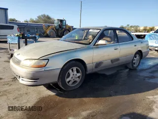 1995 Lexus ES 300 with VIN JT8GK13T6S0101694, listed as a Copart auction lot 77683754 with 247,984 mi miles and Salvage Title. Bid and sale history available at DreamBid. Image 1.