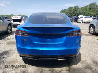 2021 Tesla Model S Plaid with VIN 5YJSA1E64MF438794, listed as a Copart auction lot 56903365 with 63,671 mi miles and Salvage title. Bid and sale history available at DreamBid. Image 6.