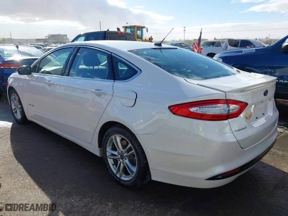2015 Ford Fusion Titanium Hybrid with VIN 3FA6P0RU9FR308973, listed as a IAAI auction lot 41754320 with 82,686 mi miles. Bid and sale history available at carsss.com. Image 3.