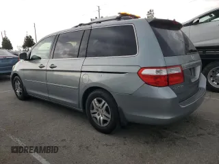 2007 Honda Odyssey EX-L z VIN 5FNRL38637B004323, wystawiony jako Copart lot #59626045 z przebiegiem 178 069 mil mil oraz Szkoda całkowita • Salvage title. Historia ofert i sprzedaży dostępna na DreamBid. Obrazek 2.